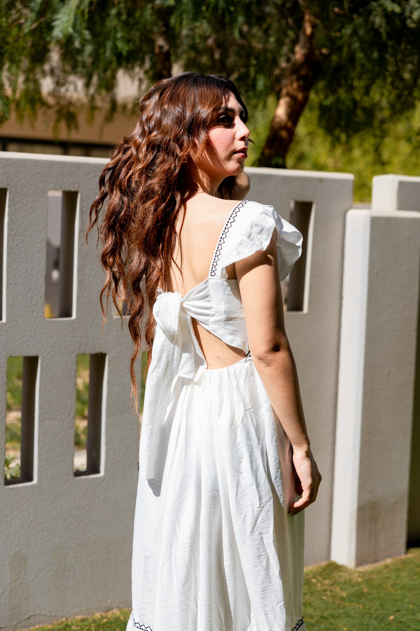 La Muse-Backless Bow Tie Maxi Dress