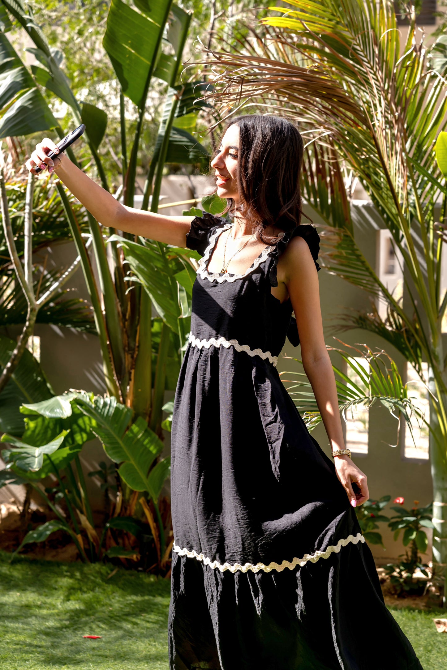 La Muse Backless Bow Tie Maxi Dress