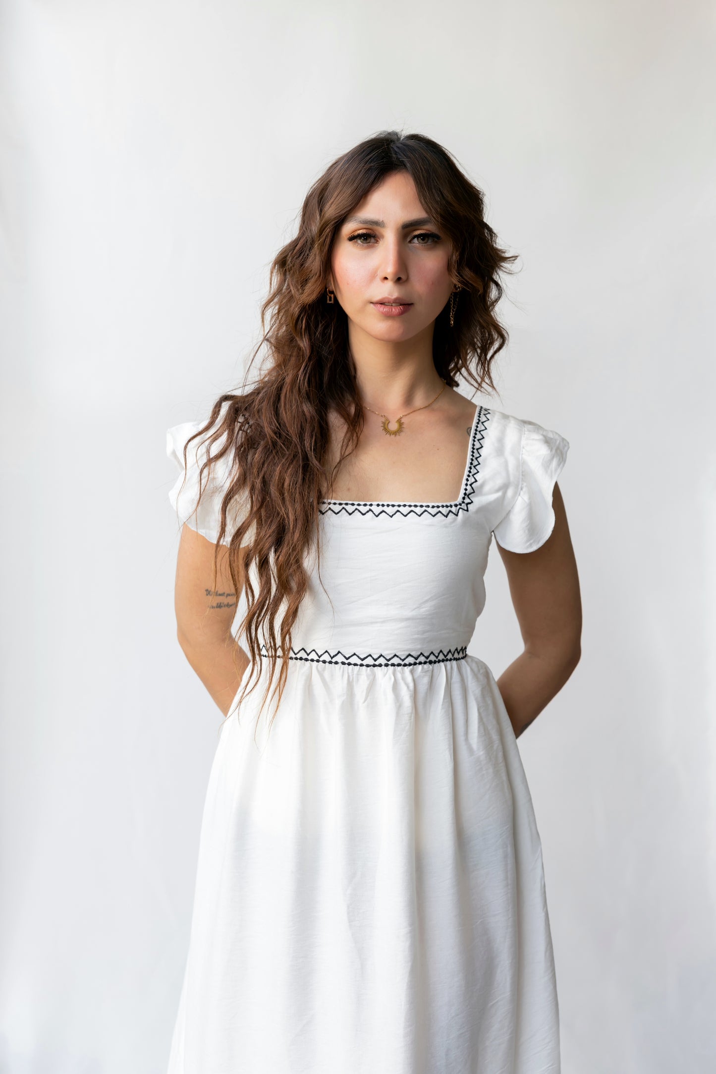 La Muse-Backless Bow Tie Maxi Dress